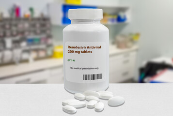 Bottle of generic Remdesivir Antiviral tablets 200 mg over blurry laboratory background. (artistic...