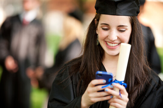 Graduation: Girl Texting Good News to Relatives