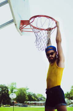 Man in yellow mesh tank