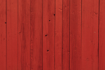 Wooden barn wall painted red