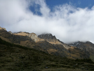 A scenic view of the rocky and mountainous terrain along the Salkantay trek in Peru