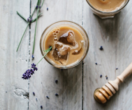 Iced cafe latte with lavender honey syrup.