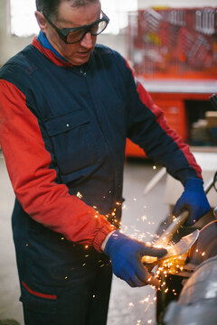 Man sharpen an ax