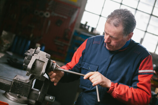 Mechanic working in auto repair shop