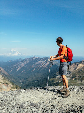 Male hiker standing on mountain summit