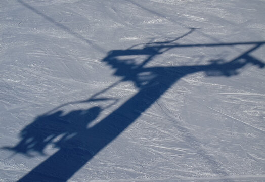 Shadow of ski lift. Picture taken in Cerro Catedral ski resort in Bariloche in the south of Argentina.