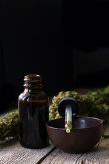 Marijuana medical oil. Cannabis dry buds. Hemp extract oil.	