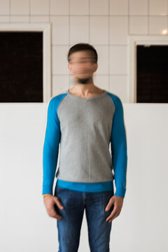 Man with blurred face