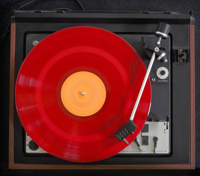 Vintage turntable with a record playing