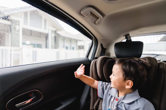 Back To School Concept.Happy Funny Little Asian Boy Raising Hands Thumb Up And Very Excited And Glad When He Go Back To School.Child From Elementary School Kindergarten.Safe Trip Safe Drive.Traveller.