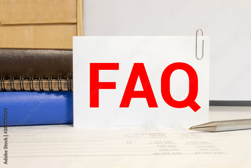 Poster notebook, pen and a cup of coffee on wooden table. notebook written faq - frequency asked question, 