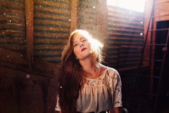 Women bathing in light