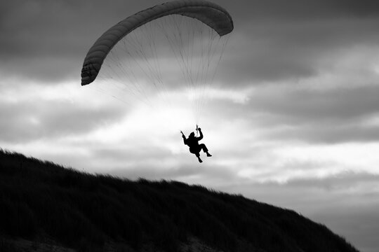 Paraglider in silhouette