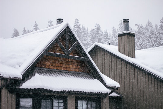 House on the mountain while heavy snowfall on winter