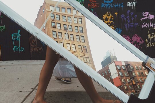 Obscured strangers and people walking on a New York City street