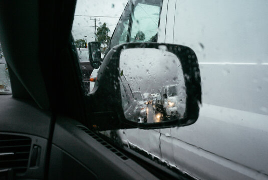 Stuck in traffic on a rainy morning commute