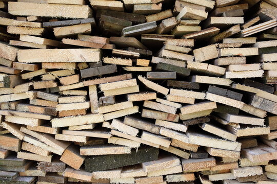Old planks cut to pieces and strored away as firewood for the winter