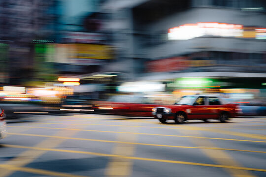 Hong Kong Taxi speeding through Intersection