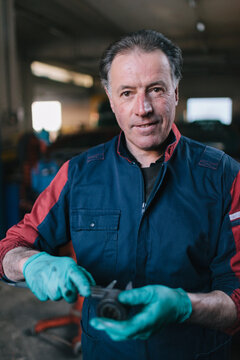 Mechanic working in auto repair shop