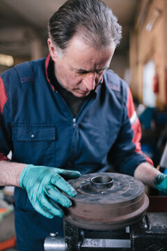 Mechanic working in auto repair shop