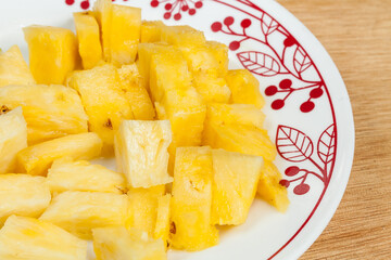 Pineapple - Ananas Comosus; Plate With Tasty Chopped Pineapple.