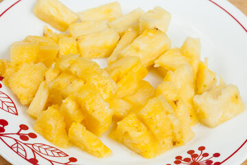 Pineapple - Ananas Comosus; Plate With Tasty Chopped Pineapple.