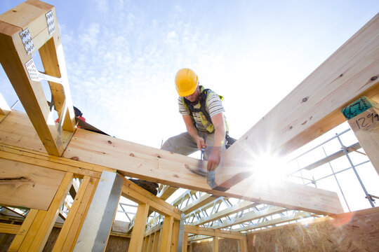Construction site (carpenters working on house build).