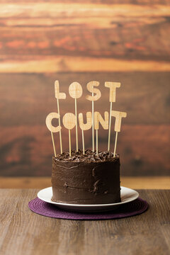 Chocolate birthday cake with ""Lost Count""
