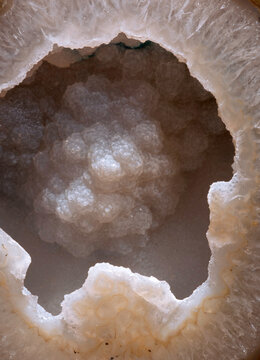 closeup macro of patterns, textures and colors of brown geode crystals crystalline