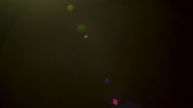 Moving source of light creating flares