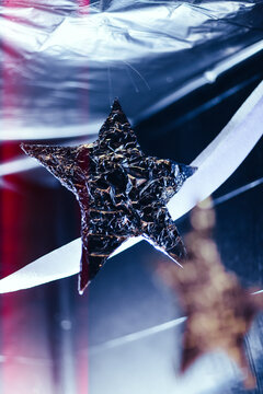 Futuristic party decorations hanging from a ceiling
