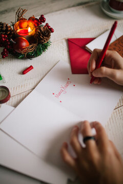 Woman Writing Christmas Card