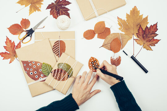 Woman preparing Christmas gifts presents