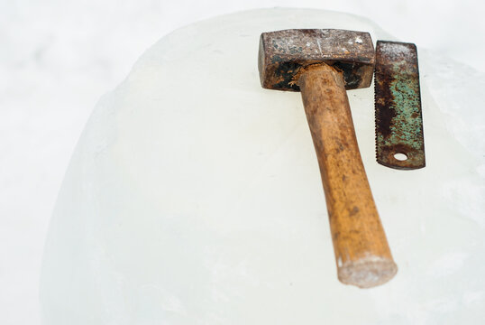 Ice sculpture tools on solid block of ice