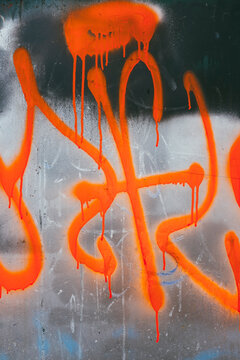 Brightly colored graffiti on building wall
