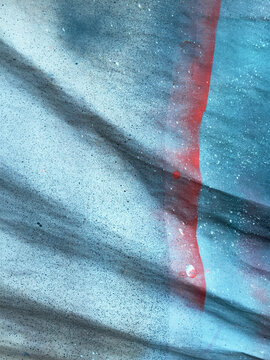 Paint samples and patterns on paper, close up
