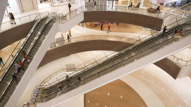 qingdao city famous downtown mall rooftop escalator hall slow motion panorama 4k china