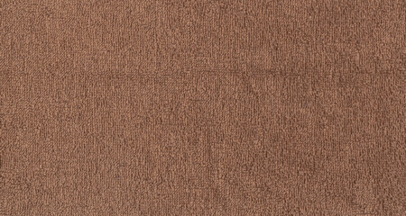 Fototapeta na wymiar Brown towel texture background. Dark beige towel texture. Textile.