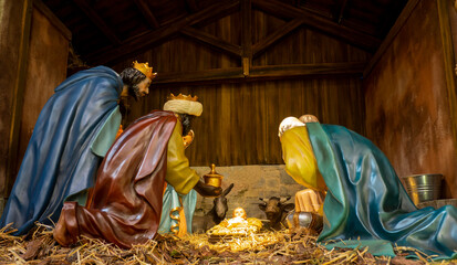 The nativity of Jesus, nativity of Christ, birth of Christ or birth of Jesus represented by small...