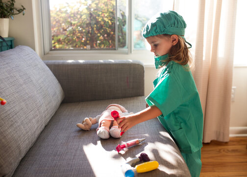little girl dressed up as doctor