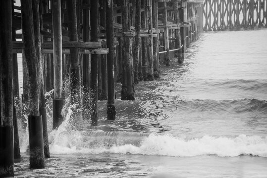 Waves Crashing on Ocean Pier