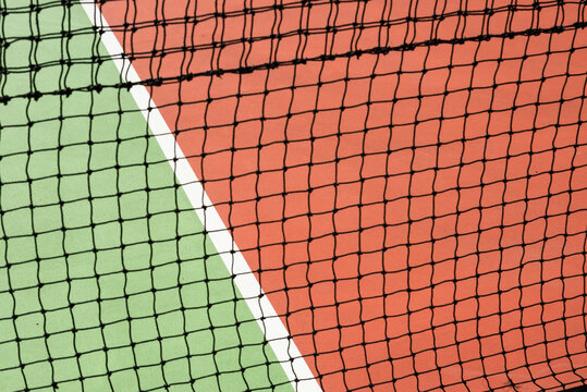 Close Up of Net and Floor of Tennis Court