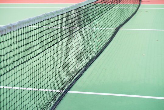 Close Up of Net and Floor of Tennis Court