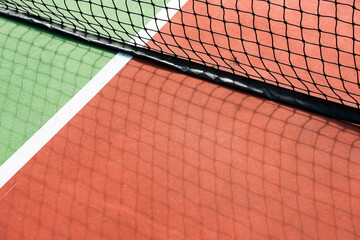 Close Up of Net and Floor of Tennis Court