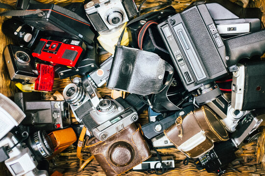 Collection of vintage cameras in a flea market
