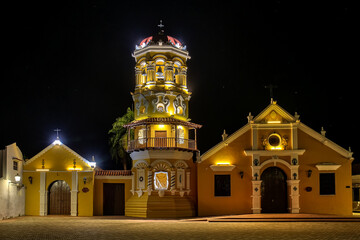 View to beautiful historic Church Santa Barbara (Iglesia de Santa Barbara) Santa Cruz de Mompox in...