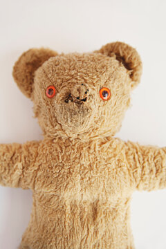 old and loved childhood teddy bear