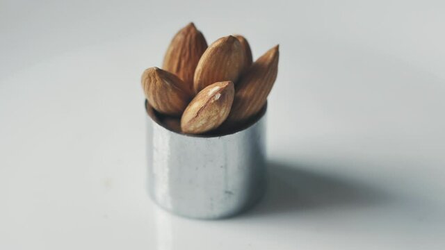 Almonds rotation on the white background - 8