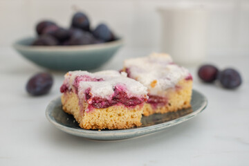 sweet home made coconut plum pie on a table