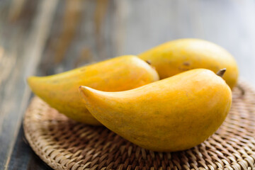 Naklejka na ściany i meble Eggfruit or canistel, Thai fruit, In Thai names such as Xiantao, Lamut Khamen or Mon khai
